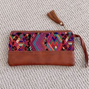 Leather clutch, handwoven stitching